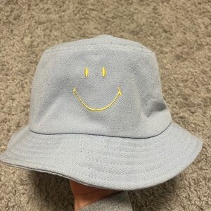 Urban outfitters baby blue smiley bucket hat